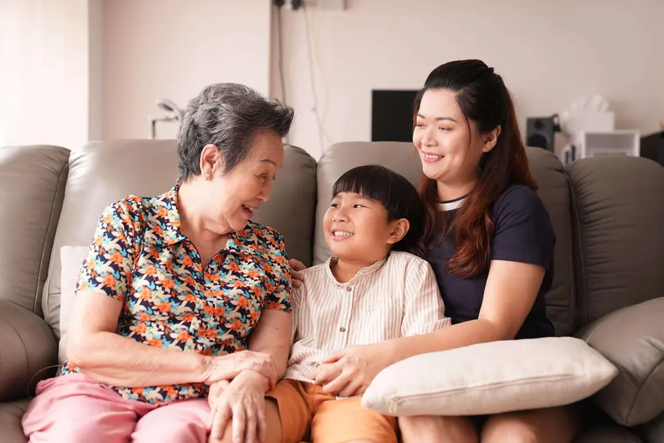 Elderly woman with daughter and grandson for SMF